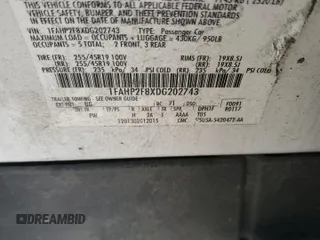 2013 Ford Taurus Limited z VIN 1FAHP2F8XDG202743, wystawiony jako Copart lot #48457145 z przebiegiem 161 331 mil mil oraz Szkoda całkowita • Salvage title. Historia ofert i sprzedaży dostępna na DreamBid. Obrazek 12.