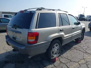 2004 Jeep Grand Cherokee Laredo with VIN 1J4GX48N24C334983, listed as a IAAI auction lot 42522088 with 169,793 mi miles and . Bid and sale history available at DreamBid. Image 4.