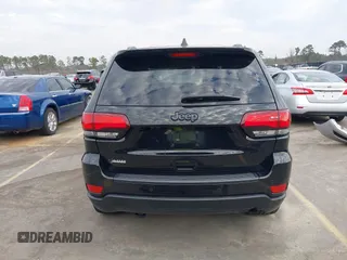 2019 Jeep Grand Cherokee Laredo E with VIN 1C4RJEAGXKC571770, listed as a IAAI auction lot 41677487 with 113,089 mi miles. Bid and sale history available at carsss.com. Image 16.