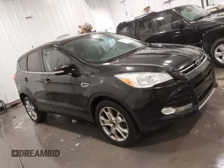 2013 Ford Escape SEL with VIN 1FMCU9H99DUD11347, listed as a IAAI auction lot 41758824 with 154,339 mi miles. Bid and sale history available at carsss.com. Image 13.