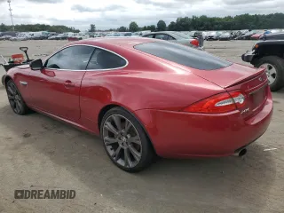 2013 Jaguar XK with VIN SAJWA4FB2DLB50515, listed as a Copart auction lot 66511554 with 147,876 mi miles and Salvage Title. Bid and sale history available at carsss.com. Image 2.