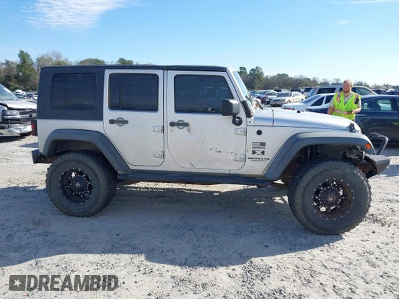 2007 Jeep Wrangler Unlimited X with VIN 1J4GB39147L199367, listed as a IAAI auction lot 40897772 with 229,309 mi miles and . Bid and sale history available at DreamBid. Image 13.