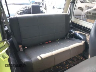 2000 Jeep Wrangler SE with VIN 1J4FA29P6YP791344, listed as a IAAI auction lot 42427688 with 184,549 mi miles and . Bid and sale history available at DreamBid. Image 8.