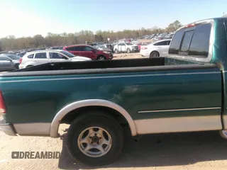 1997 Ford F-150 with VIN 1FTDF1769VNB76555, listed as a IAAI auction lot 41877502 with 322,877 mi miles and . Bid and sale history available at DreamBid. Image 8.