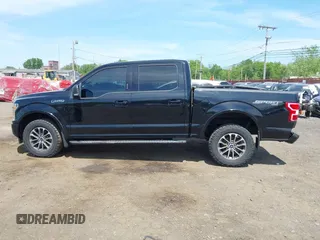 2018 Ford F-150 XL with VIN 1FTEW1EG0JFB61382, listed as a IAAI auction lot 42231412 with 101,376 mi miles and . Bid and sale history available at DreamBid. Image 14.