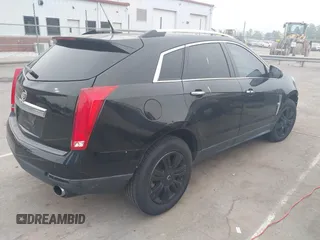 2011 Cadillac SRX Luxury Collection with VIN 3GYFNAEY2BS555800, listed as a IAAI auction lot 42118889 with 172,614 mi miles and . Bid and sale history available at carsss.com. Image 4.