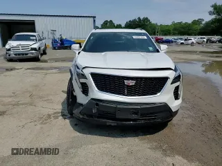 2023 Cadillac XT4 AWD Sport с VIN 1GYFZFR46PF209320, выставлен на аукционе Copart как лот 55662565 с пробегом 25 665 миль миль и Списание • Salvage title. История ставок и продаж доступна на DreamBid. Изображение 14.