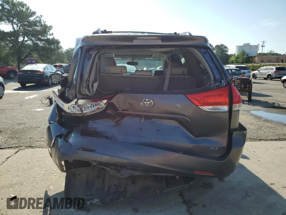 2012 Toyota Sienna XLE AAS with VIN 5TDYK3DC1CS279575, listed as a Copart auction lot 60350235 with 275,287 mi miles and Salvage title. Bid and sale history available at DreamBid. Image 6.