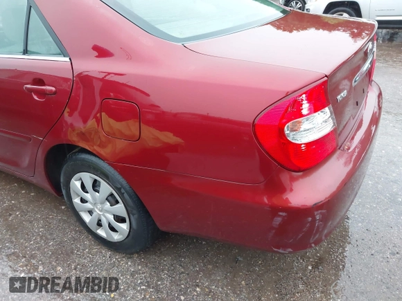 2003 Toyota Camry LE with VIN JTDBE32K630159278, listed as a IAAI auction lot 42148712 with 184,999 mi miles and . Bid and sale history available at DreamBid. Image 6.