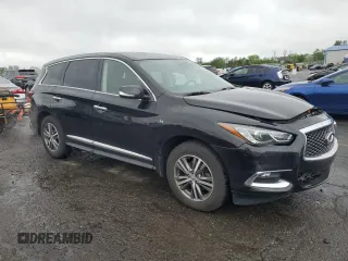 2020 Infiniti QX60 Pure with VIN 5N1DL0MM8LC517826, listed as a Copart auction lot 56527385 with 83,767 mi miles and Salvage title. Bid and sale history available at DreamBid. Image 4.