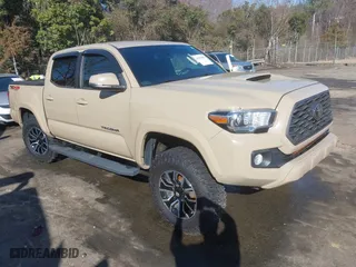 2020 Toyota Tacoma 4WD SR5 with VIN 3TMCZ5AN5LM331149, listed as a IAAI auction lot 41633864 with 74,862 mi miles. Bid and sale history available at carsss.com. Image 1.