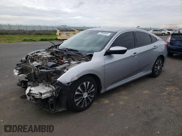 2019 Honda Civic Sedan LX with VIN 19XFC2F61KE200100, listed as a Copart auction lot 37959484 with 131,847 mi miles and Salvage Title. Bid and sale history available at carsss.com. Image 1.