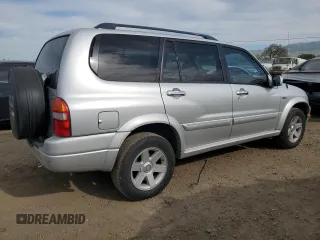 2003 Suzuki XL7 Touring z VIN JS3TX92V934111781, wystawiony jako Copart lot #47422395 z przebiegiem 248 137 mil mil oraz Czysty tytuł • Clean title. Historia ofert i sprzedaży dostępna na DreamBid. Obrazek 3.