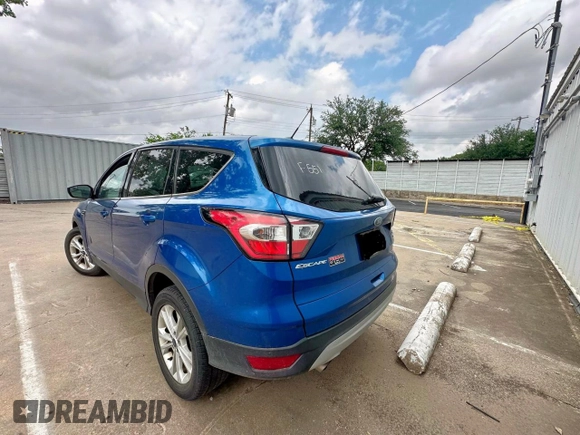 2017 Ford Escape SE with VIN 1FMCU0GD5HUD23115, listed as a Copart auction lot 55538605 with 140,633 mi miles and Clean Title. Bid and sale history available at carsss.com. Image 3.