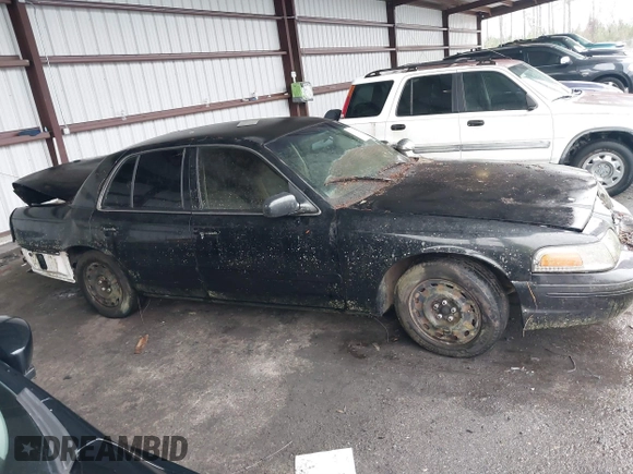 2000 Ford Crown Victoria Police Interceptor z VIN 2FAFP71W4YX199199, wystawiony jako IAAI lot #41610176 z przebiegiem 202 131 mil mil oraz . Historia ofert i sprzedaży dostępna na DreamBid. Obrazek 13.
