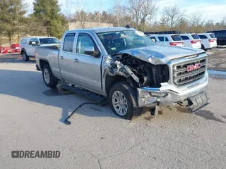 2017 GMC Sierra 1500 SLE z VIN 1GTV2MEC8HZ251740, wystawiony jako IAAI lot #41315038 z przebiegiem 127 575 mil mil oraz . Historia ofert i sprzedaży dostępna na DreamBid. Obrazek 1.