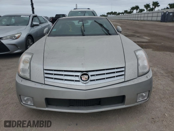 2008 Cadillac XLR z VIN 1G6YV36A285600199, wystawiony jako Copart lot #76229514 z przebiegiem Nie podano mil oraz Szkoda całkowita • Salvage title. Historia ofert i sprzedaży dostępna na DreamBid. Obrazek 5.