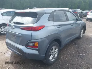 2019 Hyundai Kona SE with VIN KM8K12AAXKU298329, listed as a IAAI auction lot 42297990 with 57,176 mi miles and . Bid and sale history available at DreamBid. Image 4.