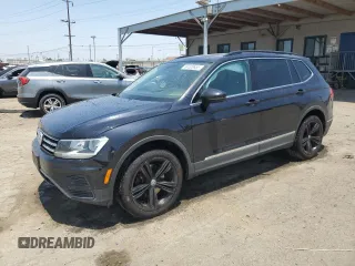 2018 Volkswagen Tiguan SEL with VIN 3VV3B7AX0JM051848, listed as a Copart auction lot 60320655 with 75,141 mi miles and Salvage title. Bid and sale history available at DreamBid. Image 1.