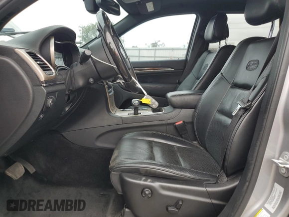 2015 Jeep Grand Cherokee Overland with VIN 1C4RJECG4FC808241, listed as a Copart auction lot 59699685 with 67,542 mi miles and Salvage title. Bid and sale history available at DreamBid. Image 7.