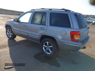 2001 Jeep Grand Cherokee Limited with VIN 1J4GW58N61C670589, listed as a IAAI auction lot 41817712 with 185,905 mi miles. Bid and sale history available at carsss.com. Image 3.