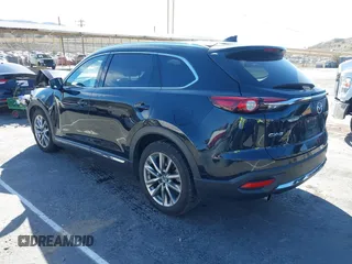 2018 Mazda CX-9 Grand Touring z VIN JM3TCADY8J0221221, wystawiony jako IAAI lot #41644721 z przebiegiem 41 510 mil mil oraz . Historia ofert i sprzedaży dostępna na DreamBid. Obrazek 3.