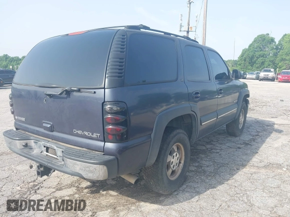 2002 Chevrolet Tahoe LS z VIN 1GNEC13ZX2R273935, wystawiony jako IAAI lot #42246472 z przebiegiem 205 995 mil mil oraz . Historia ofert i sprzedaży dostępna na DreamBid. Obrazek 4.