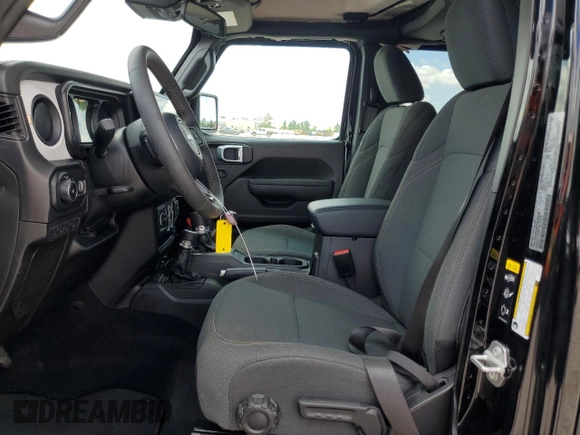 2024 Jeep Wrangler Sport S with VIN 1C4PJXDNXRW349946, listed as a Copart auction lot 56701185 with 6,310 mi miles and Salvage Title. Bid and sale history available at DreamBid. Image 7.