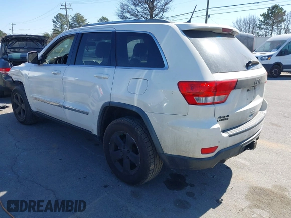 2012 Jeep Grand Cherokee Laredo with VIN 1C4RJFAT4CC229204, listed as a IAAI auction lot 41659491 with 141,143 mi miles. Bid and sale history available at carsss.com. Image 3.