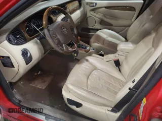 2004 Jaguar X-Type with VIN SAJEA51CX4WE15195, listed as a Copart auction lot 57868405 with 171,698 mi miles and Non Repairable. Bid and sale history available at DreamBid. Image 7.