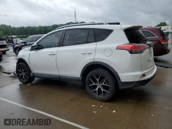 2018 Toyota RAV4 SE with VIN 2T3NFREV5JW416779, listed as a Copart auction lot 60283105 with 64,255 mi miles and Salvage title. Bid and sale history available at DreamBid. Image 2.