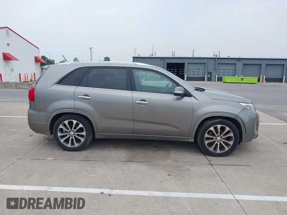 2014 Kia Sorento SX z VIN 5XYKW4A77EG434282, wystawiony jako IAAI lot #42513036 z przebiegiem 175 186 mil mil oraz . Historia ofert i sprzedaży dostępna na DreamBid. Obrazek 13.