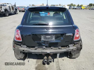2011 MINI Hardtop S with VIN WMWSV3C57BTY16043, listed as a Copart auction lot 59337575 with 84,617 mi miles and Salvage title. Bid and sale history available at DreamBid. Image 6.