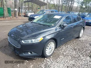 2015 Ford Fusion SE Hybrid with VIN 3FA6P0LU5FR190333, listed as a IAAI auction lot 41802327 with 256,747 mi miles. Bid and sale history available at carsss.com. Image 17.