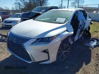 2018 Lexus RX with VIN JTJGZKCA1J2006400, listed as a IAAI auction lot 41717854 with 141,528 mi miles. Bid and sale history available at carsss.com. Image 16.