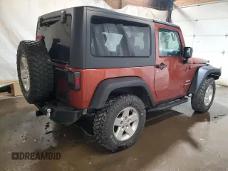 2014 Jeep Wrangler Sport with VIN 1C4AJWAG7EL197285, listed as a Copart auction lot 63451105 with 141,547 mi miles and Salvage title. Bid and sale history available at DreamBid. Image 3.