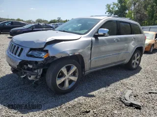 2016 Jeep Grand Cherokee Overland z VIN 1C4RJECGXGC321207, wystawiony jako Copart lot #54488655 z przebiegiem 59 746 mil mil oraz Szkoda całkowita • Salvage title. Historia ofert i sprzedaży dostępna na DreamBid. Obrazek 1.