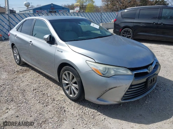 2015 Toyota Camry Hybrid LE with VIN 4T1BD1FKXFU159875, listed as a IAAI auction lot 42041323 with 240,779 mi miles. Bid and sale history available at carsss.com. Image 1.