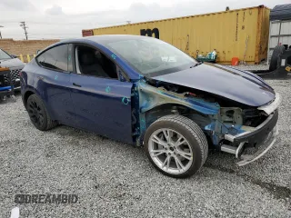 2021 Tesla Model Y Long Range with VIN 5YJYGDEEXMF213376, listed as a Copart auction lot 39659674 with 76,110 mi miles and Salvage Title. Bid and sale history available at DreamBid. Image 4.