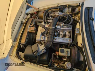 1982 Alfa Romeo Spider Veloce z VIN ZARBA5414C1014655, wystawiony jako Copart lot #74420044 z przebiegiem 63 266 mil mil oraz Szkody całkowita. Historia ofert i sprzedaży dostępna na DreamBid. Obrazek 11.