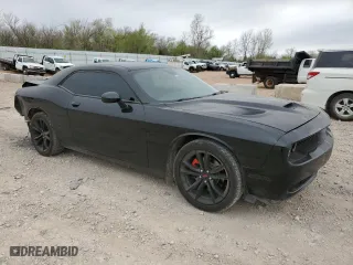 2017 Dodge Challenger SXT Plus with VIN 2C3CDZAG7HH650540, listed as a Copart auction lot 50882965 with 125,670 mi miles and Salvage Title. Bid and sale history available at carsss.com. Image 4.