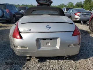 2005 Nissan 350Z Touring z VIN JN1AZ36A95M751810, wystawiony jako Copart lot #55104085 z przebiegiem 99 278 mil mil oraz Szkoda całkowita • Salvage title. Historia ofert i sprzedaży dostępna na DreamBid. Obrazek 6.