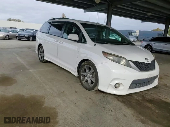 2012 Toyota Sienna SE with VIN 5TDXK3DC9CS215991, listed as a Copart auction lot 51868005 with 215,075 mi miles and Salvage title. Bid and sale history available at DreamBid. Image 12.