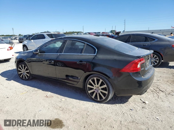 2015 Volvo S60 T5 Drive-E Platinum with VIN YV140MFD6F2301849, listed as a Copart auction lot 82231124 with Not Provided miles and Clean Title. Bid and sale history available at carsss.com. Image 2.