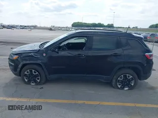 2017 Jeep Compass Trailhawk z VIN 3C4NJDDB6HT631047, wystawiony jako IAAI lot #42457508 z przebiegiem 59 414 mil mil oraz . Historia ofert i sprzedaży dostępna na DreamBid. Obrazek 14.