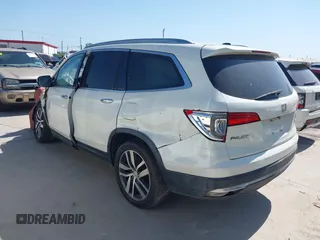 2016 Honda Pilot Touring with VIN 5FNYF6H97GB088824, listed as a IAAI auction lot 41991803 with 84,761 mi miles. Bid and sale history available at carsss.com. Image 3.
