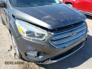 2018 Ford Escape Titanium with VIN 1FMCU0J99JUB09562, listed as a IAAI auction lot 41547659 with 63,700 mi miles and . Bid and sale history available at DreamBid. Image 6.