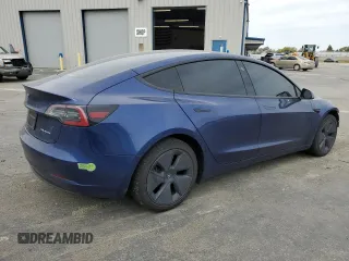 2023 Tesla Model 3 Long Range with VIN 5YJ3E1EB0PF388986, listed as a Copart auction lot 49823045 with 93,870 mi miles and Salvage Title. Bid and sale history available at DreamBid. Image 3.