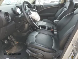 2014 MINI Countryman S with VIN WMWZC5C55EWM18087, listed as a Copart auction lot 68661614 with Not provided miles and Salvage title. Bid and sale history available at DreamBid. Image 7.