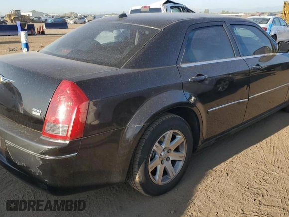 2006 Chrysler 300 Touring with VIN 2C3LA53G06H125654, listed as a Copart auction lot 71224414 with 145,759 mi miles and Salvage Title. Bid and sale history available at carsss.com. Image 3.